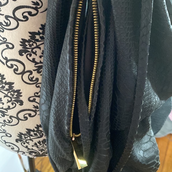 CC sky hobo black leather snakeskin zippers on the side with gold trim. - Picture 4 of 7